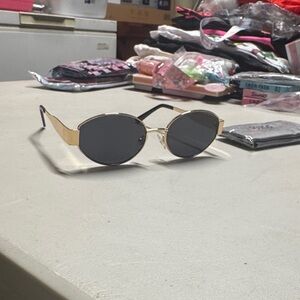 Women's Gold Frame Oval Sunglasses with Black Lenses